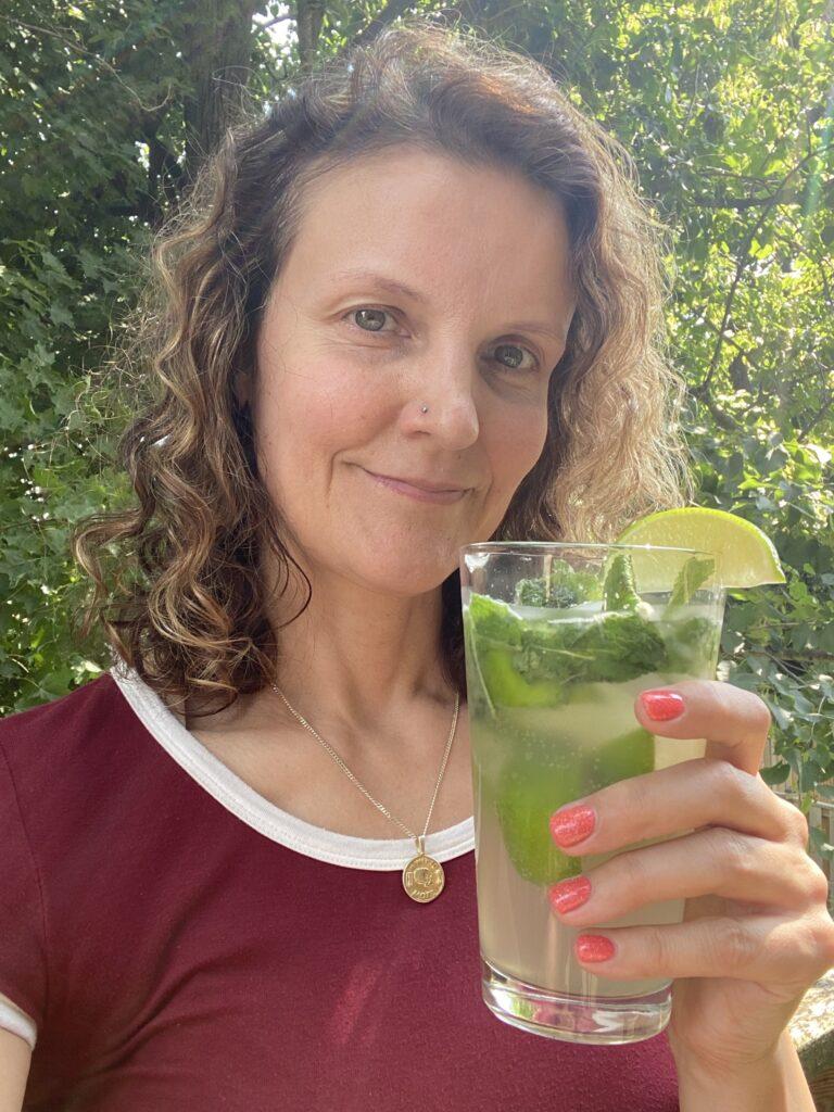 Marge drinking a mohito