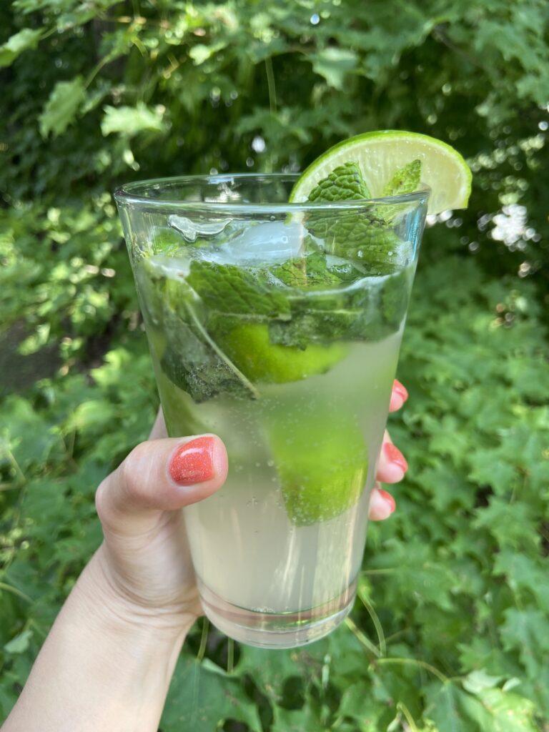 Marge holding a mohito