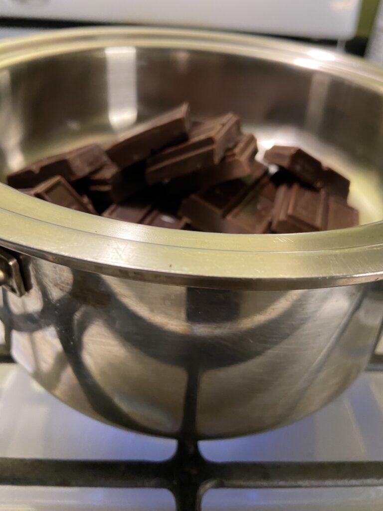 Levo Chocolate drops - chocolate squares in double broiler.